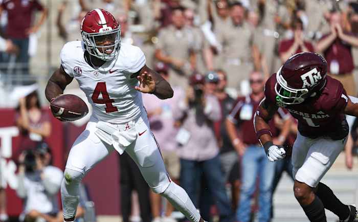 Jalen Milroe avoids the Texas A&M defense